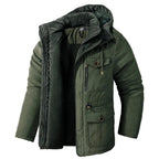 Green winter jacket with a fur-lined hood on a white background