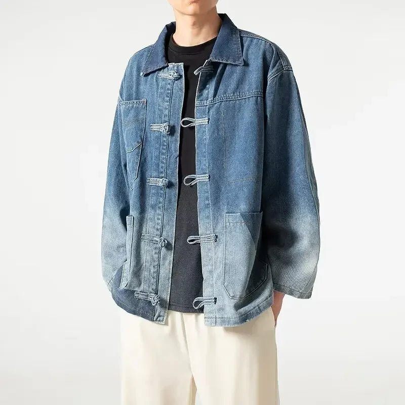 Person wearing a blue denim jacket on a white background