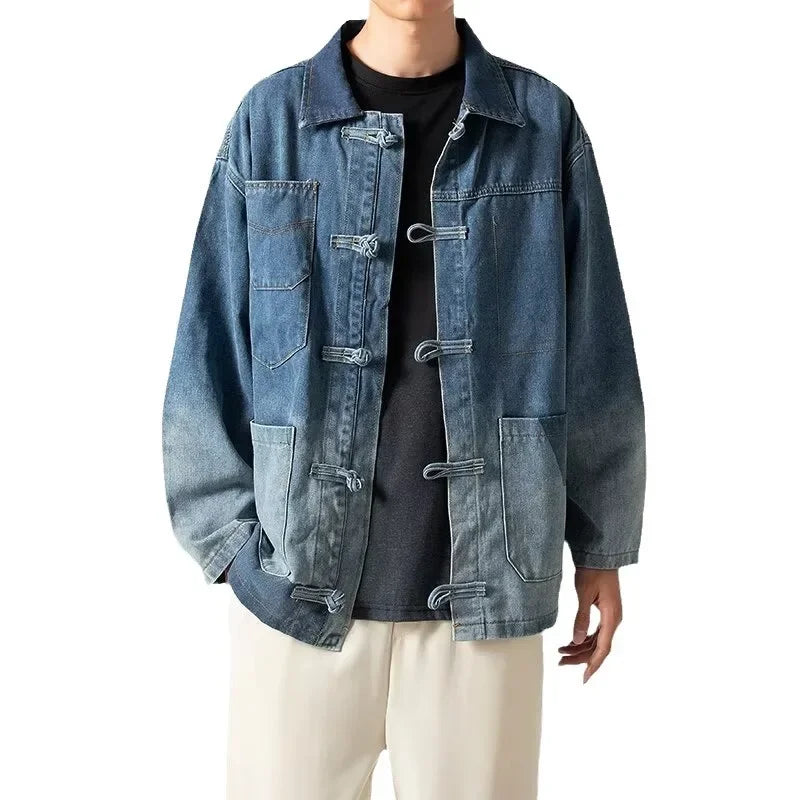 Person wearing a blue denim jacket on a white background
