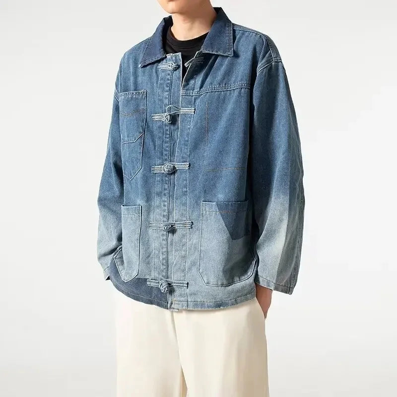 Person wearing a blue denim jacket on a white background