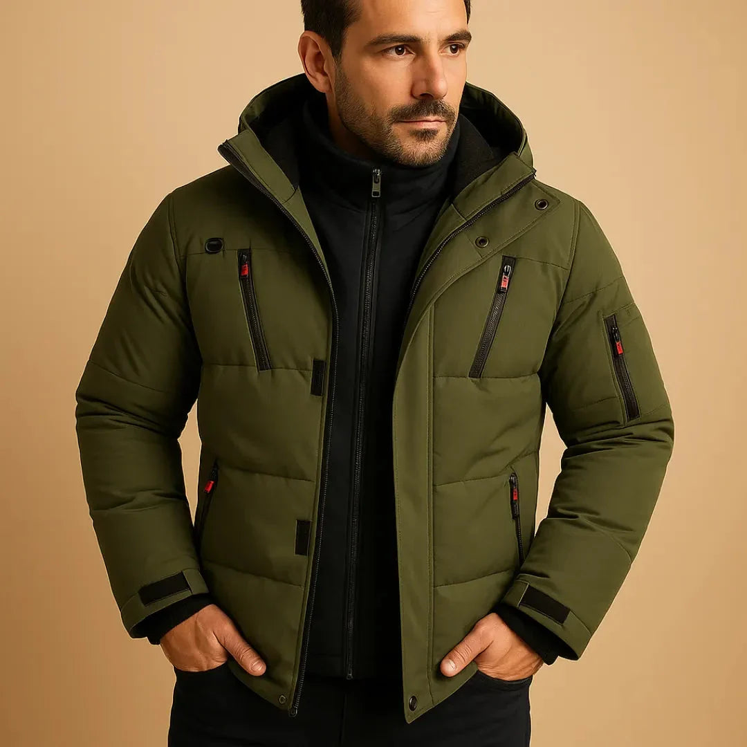 Man wearing a green winter jacket on a beige background
