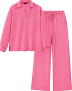 A two-piece pink loungewear set featuring a long-sleeve collared knit top and matching wide-leg drawstring pants, both with a subtle textured chevron pattern, shown on a plain white background.