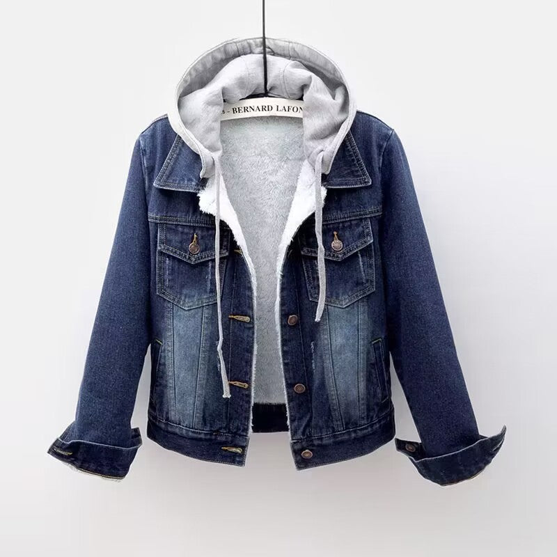 Blue denim jacket with gray hoodie on a white background