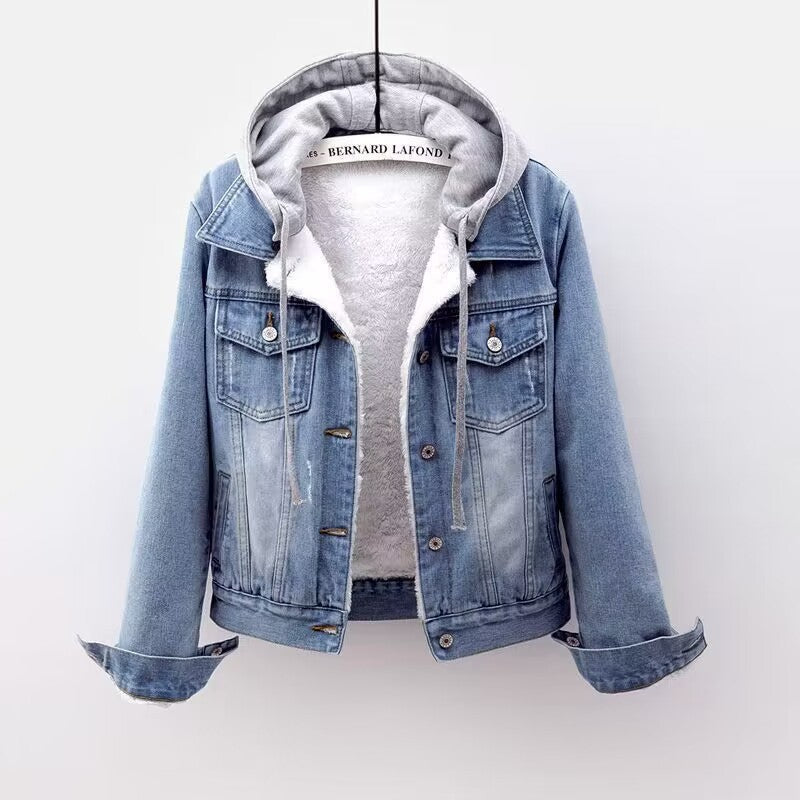 Blue denim jacket with a gray hoodie on a white background