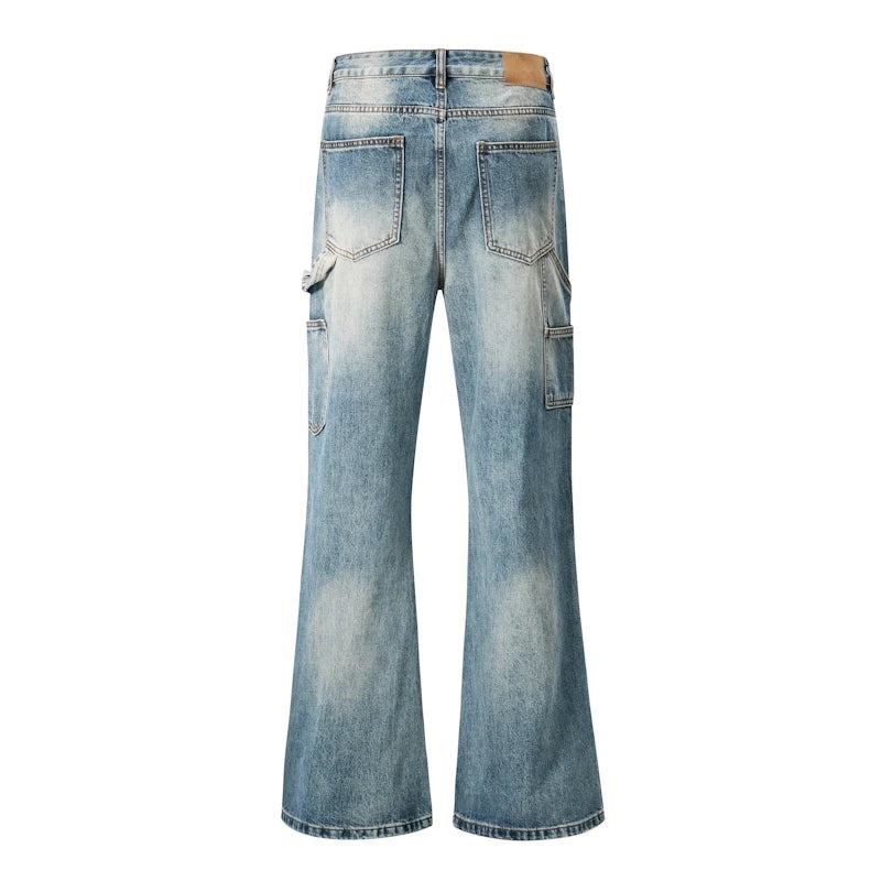 Light blue wash denim cargo flare jeans shown from the back, featuring a brown leather patch on the waistband and multiple cargo pockets, set against a plain white background.