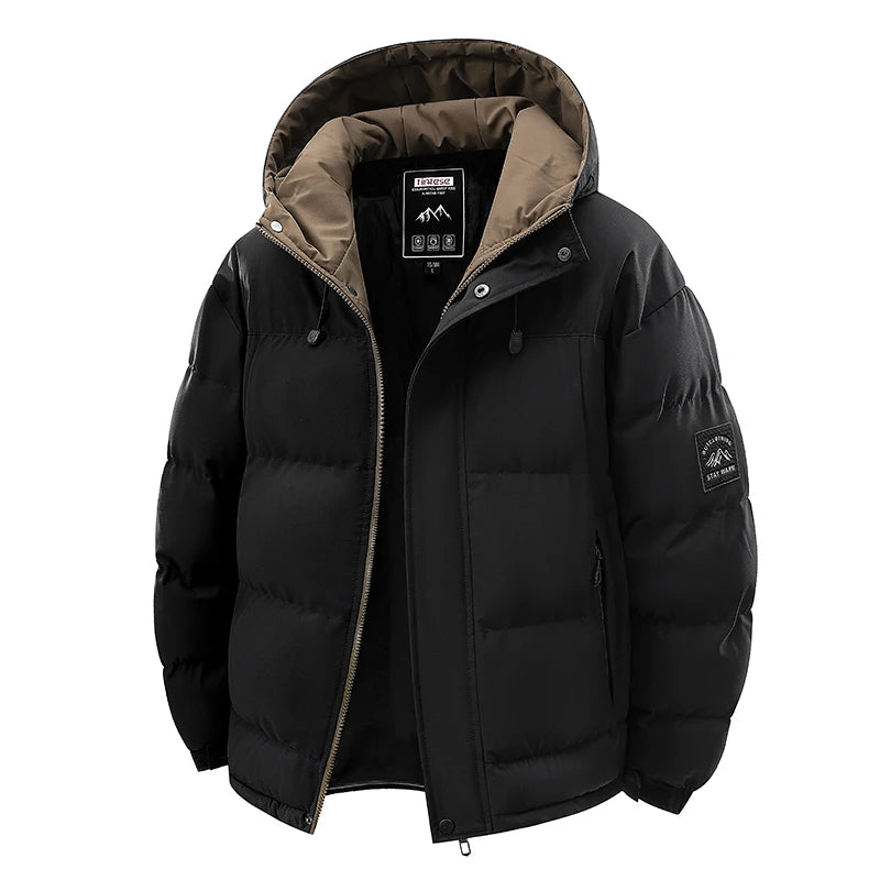 Black puffer jacket with brown hood on a white background