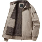 A men's beige utility jacket with a dark brown sherpa fleece lining, shown open against a plain white background.