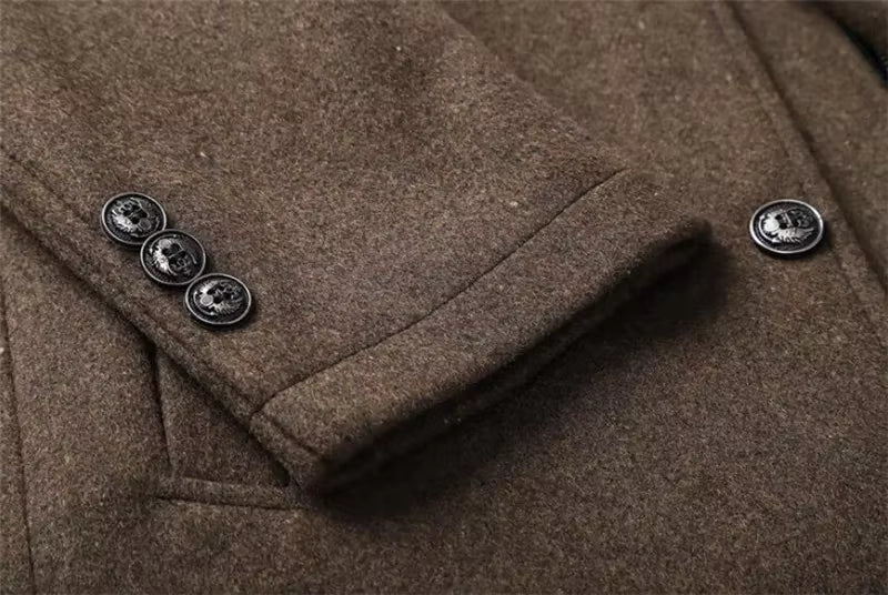 Close-up of a brown wool coat sleeve with three dark buttons and a matching button on the cuff, showing the textured fabric detail.