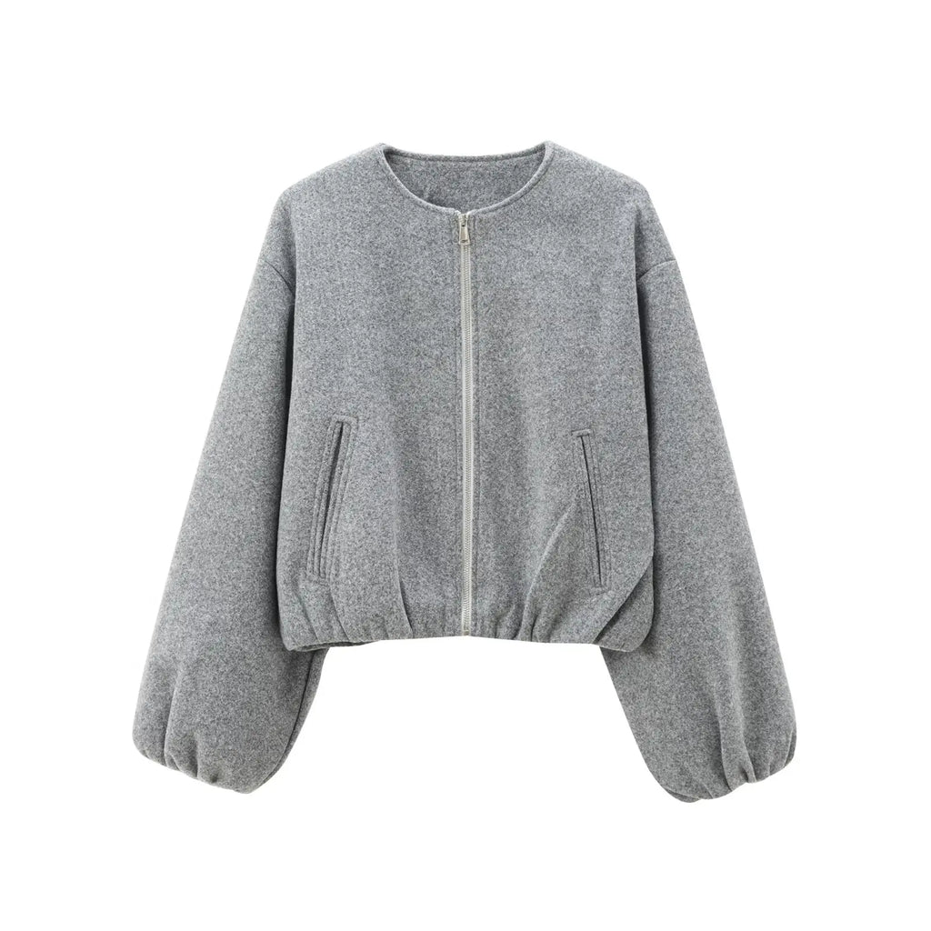Gray sweater with balloon sleeves on a white background