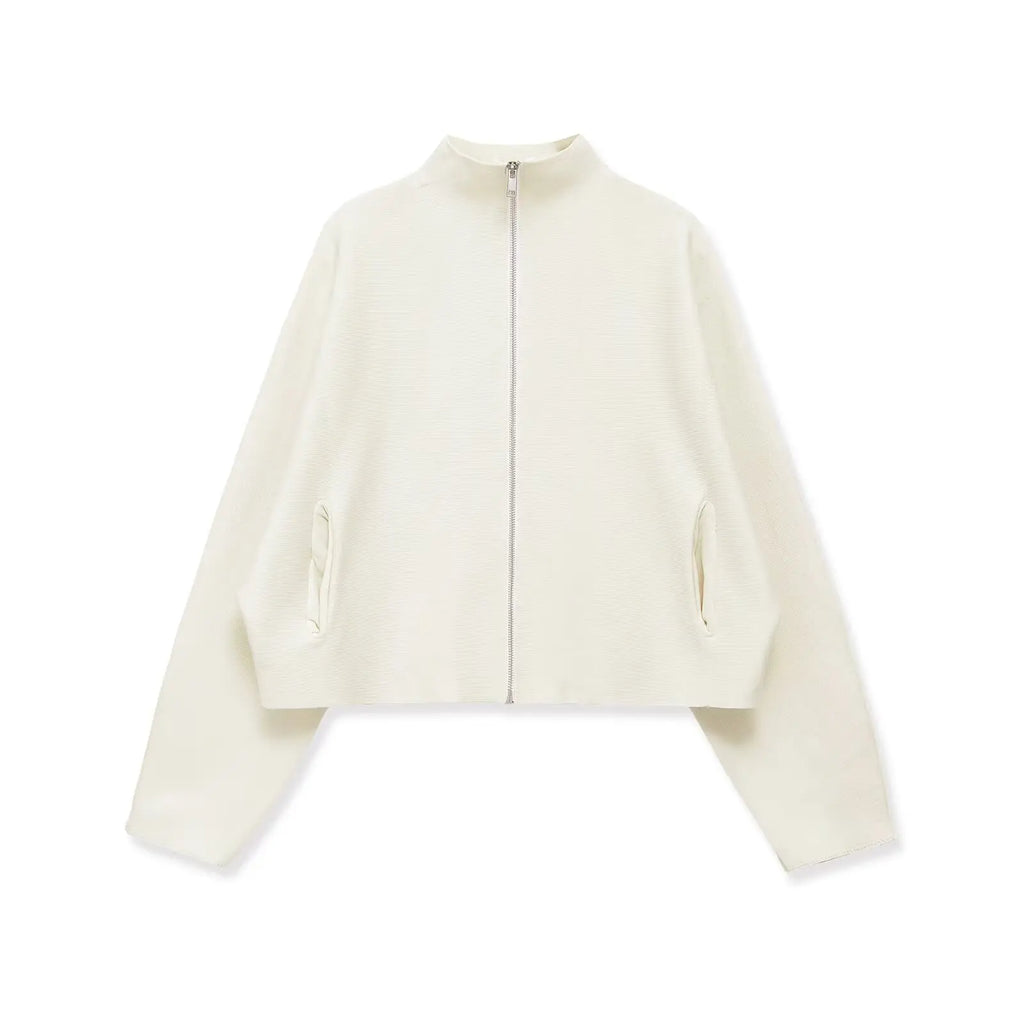 An off-white cropped zip-up jacket with a stand collar and side slit pockets, displayed on a clean white background.