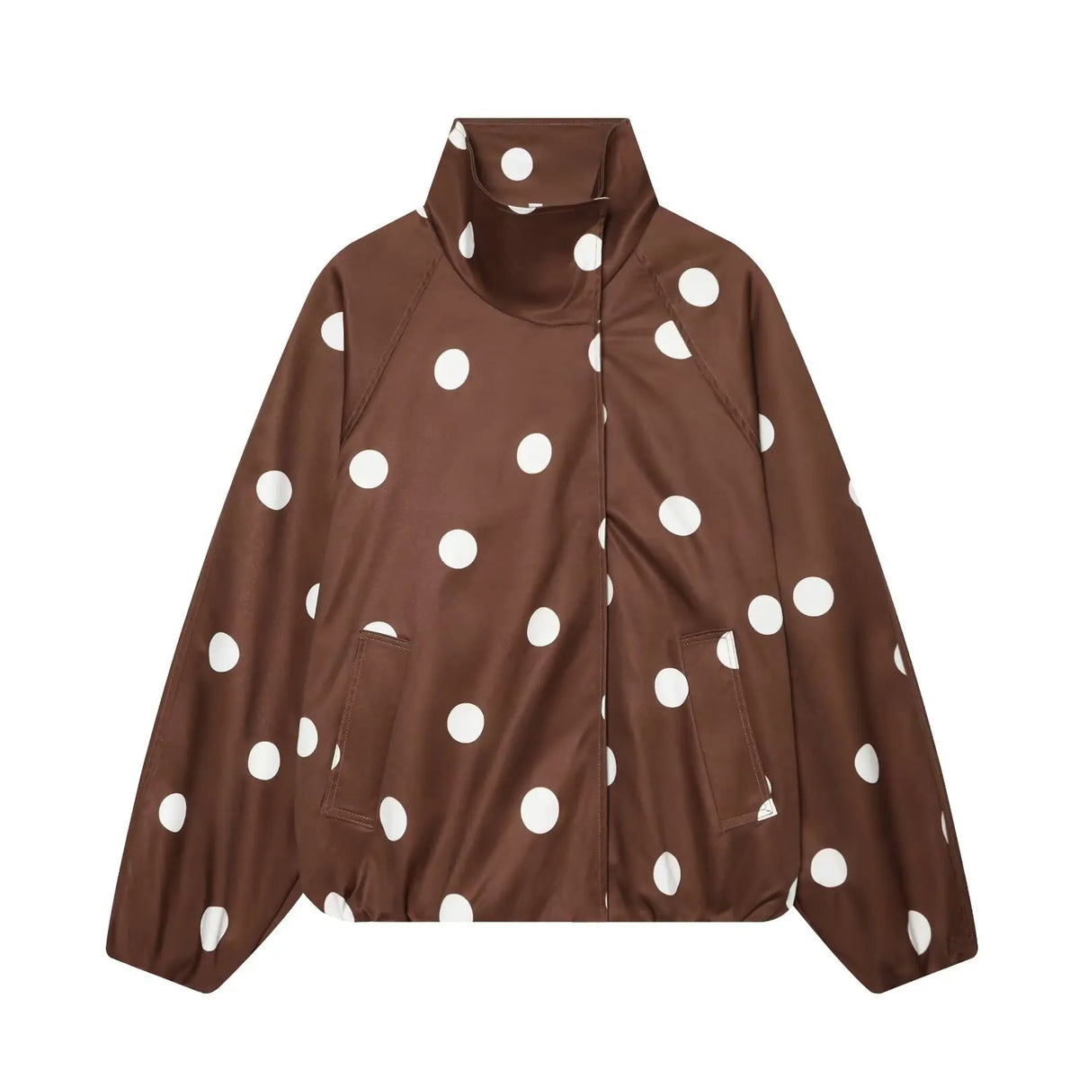 A brown zip-up jacket with a high mock neck collar, featuring a white polka dot pattern, displayed on a solid white background.
