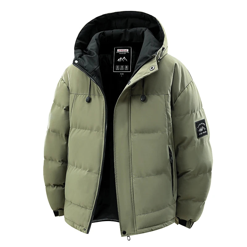 Green puffer jacket with black interior on a white background