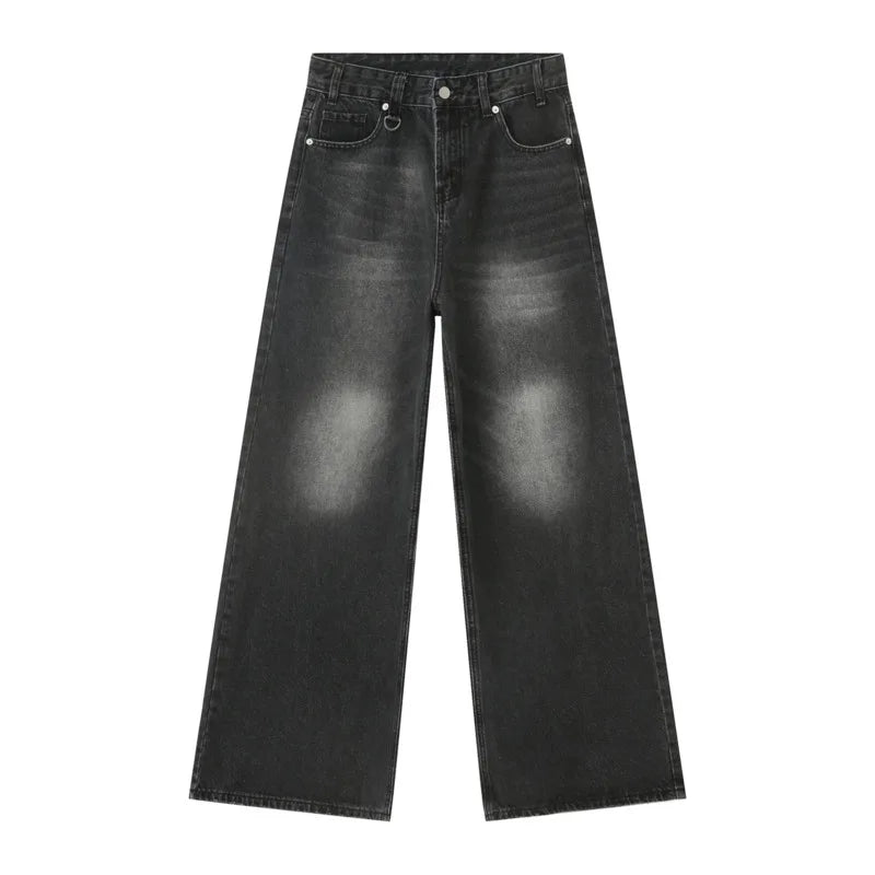 Black distressed jeans on a white background
