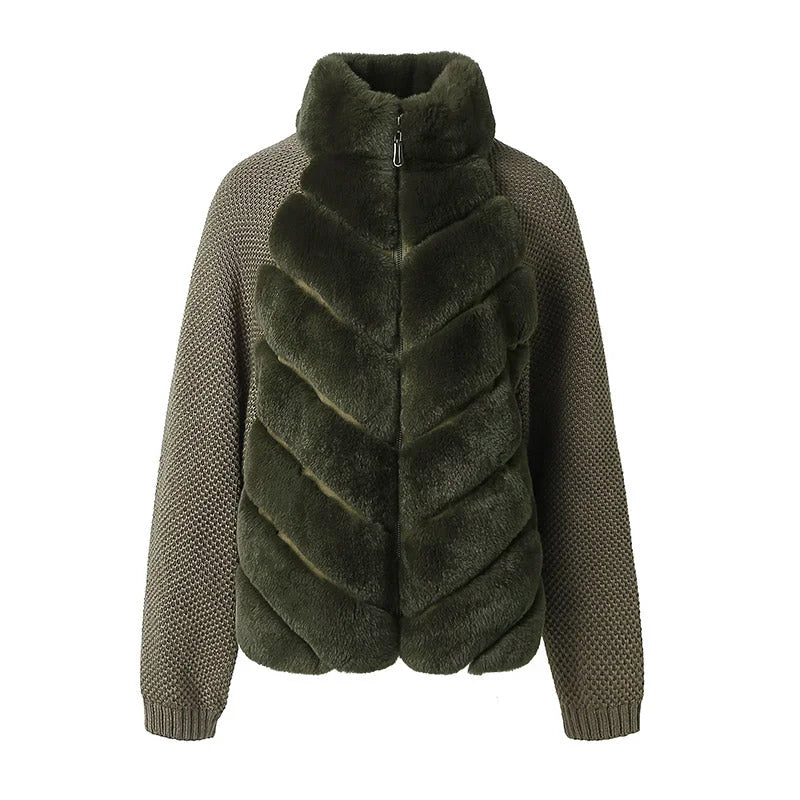 An olive green jacket featuring a plush faux-fur chevron pattern on the front and textured knit sleeves, shown against a plain white background.