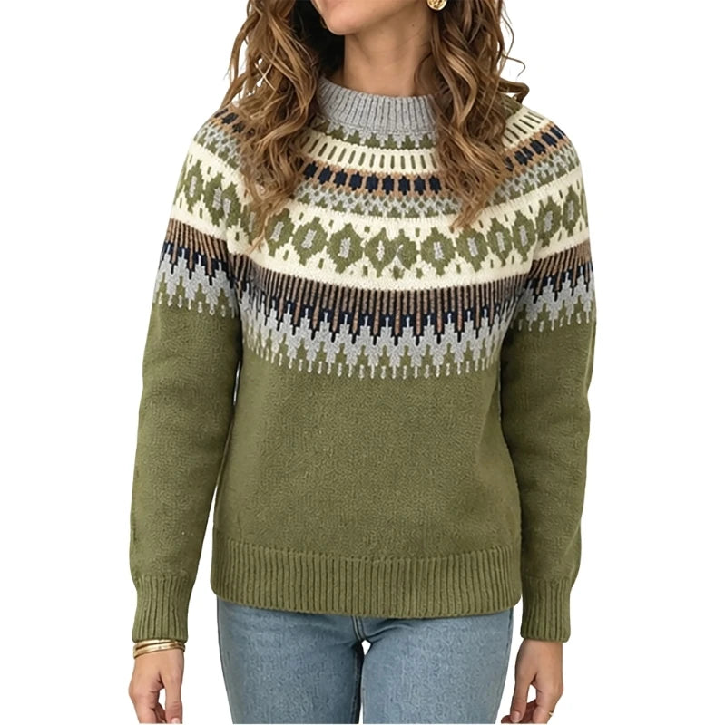 A woman wearing a long-sleeve knit sweater with a Fair Isle pattern. The sweater features an olive green body, a cream-colored yoke with green and brown geometric patterns, and a gray ribbed crew neck and cuffs.