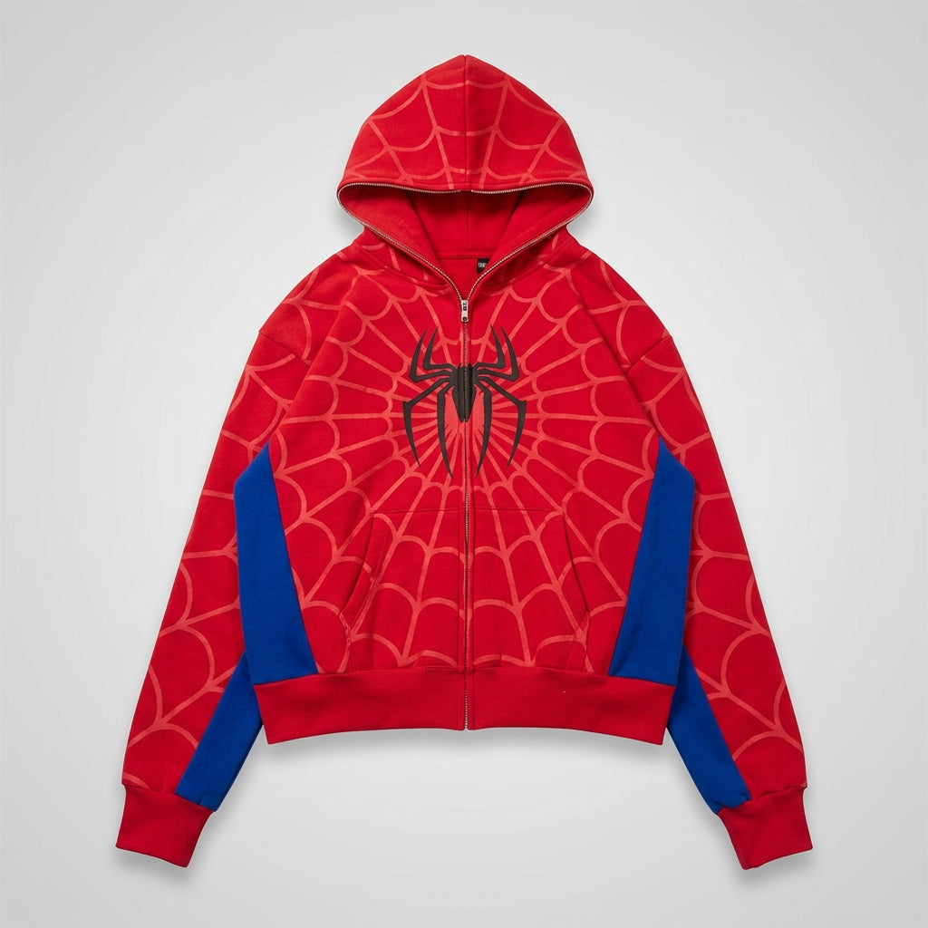 Red hoodie with spider web pattern and blue sleeves on a concrete floor