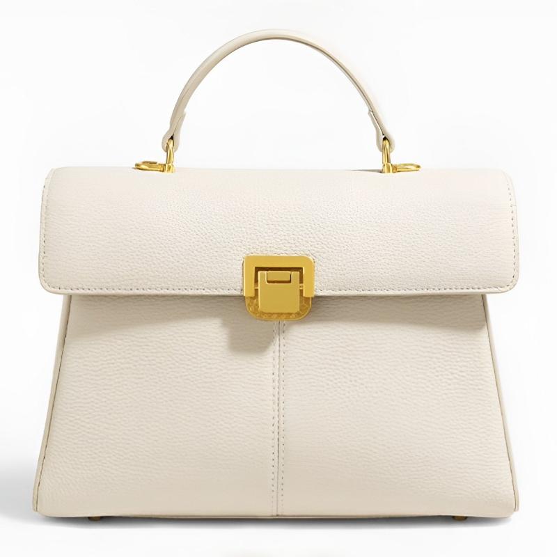 White handbag with gold accents on a white background