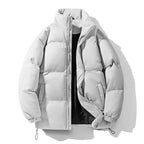Light gray puffer jacket on a white background