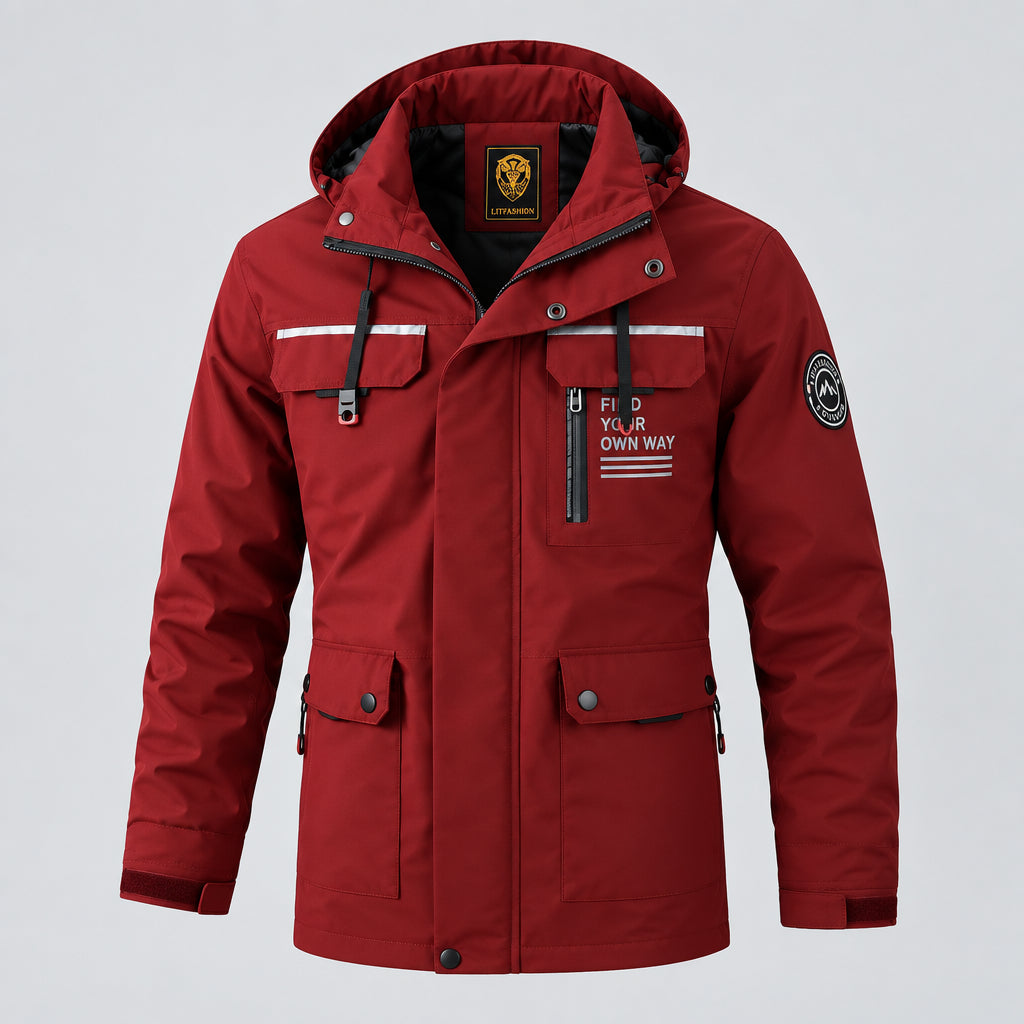 Red jacket with multiple pockets and zippers on a blurred snowy background