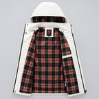 Plaid jacket with white hood against a snowy background
