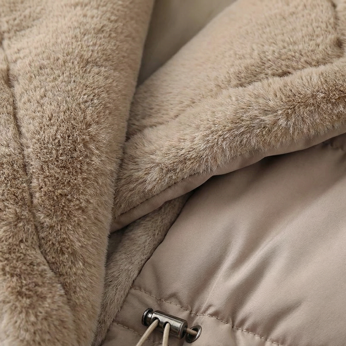 Close-up of a beige puffer jacket with fur lining