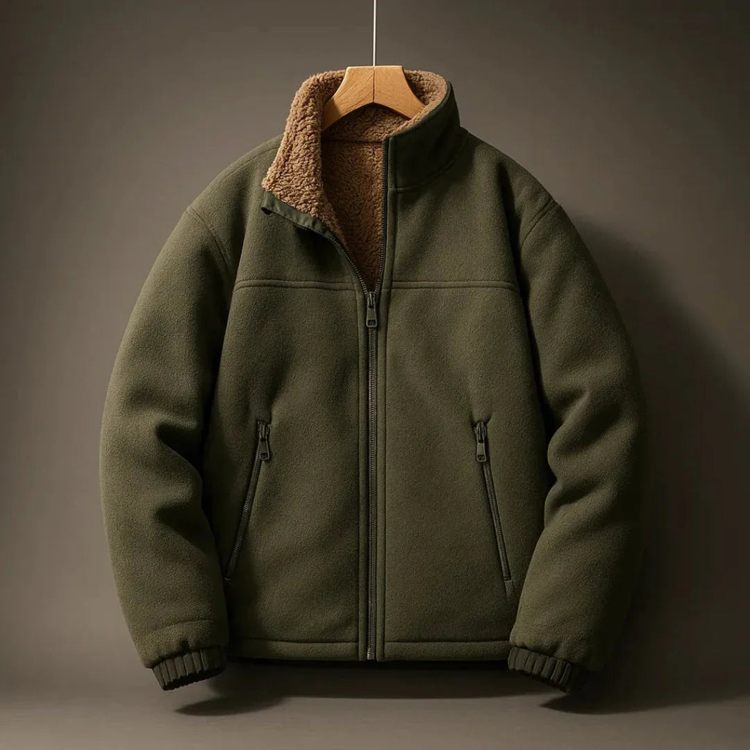 Green jacket with brown sherpa lining on a hanger against a dark background