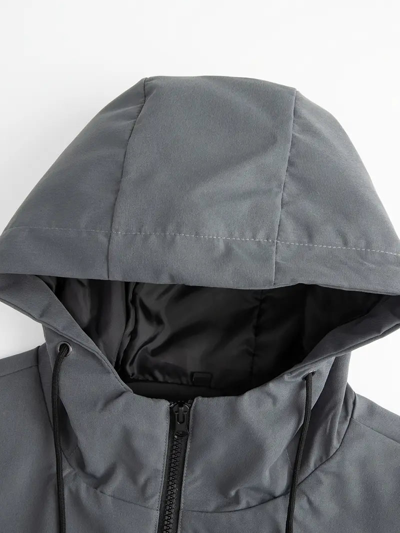 Close-up of a gray hooded jacket on a white background