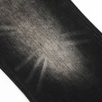 Close-up of black denim fabric with visible texture