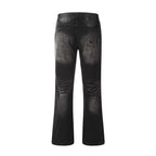 Black distressed jeans on a white background