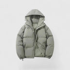 Light gray puffer jacket with a hood on a white background