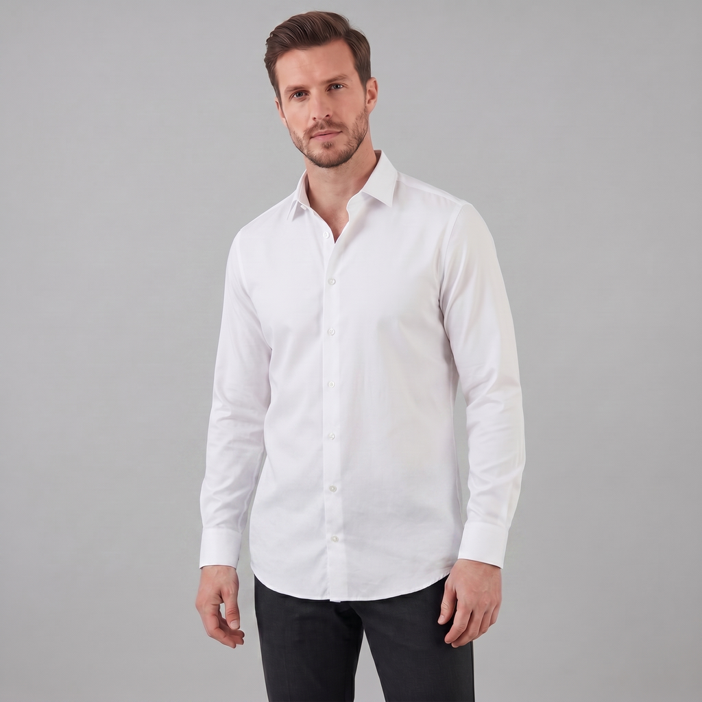 Man wearing a white dress shirt against a gray background