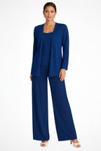 Woman wearing a blue pantsuit on a white background